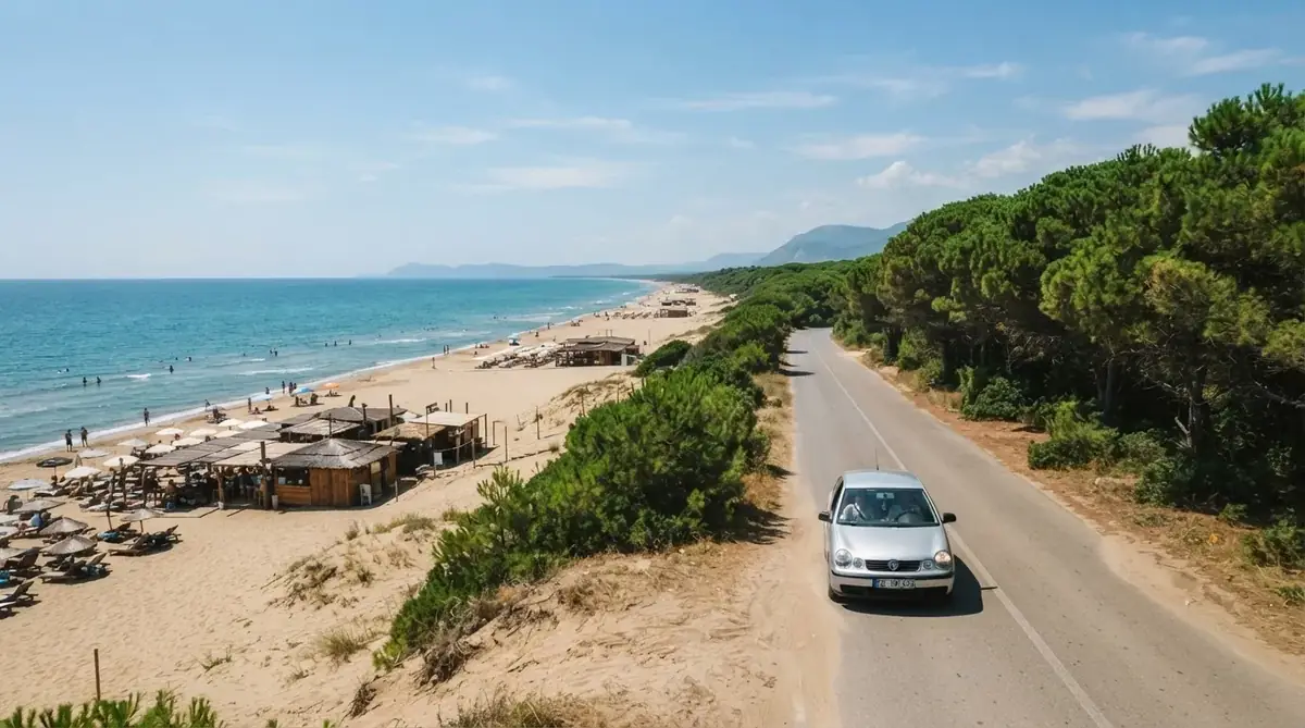 Small rental car driving the Velika Plaža beach road near Ulcinj